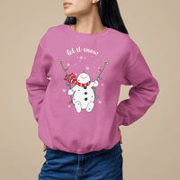 Azalea pink Christmas sweatshirt with “Let it snow” snowman graphic