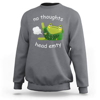 Charcoal sweatshirt with frog graphic and 'no thoughts'/'head empty' print, crew neck.