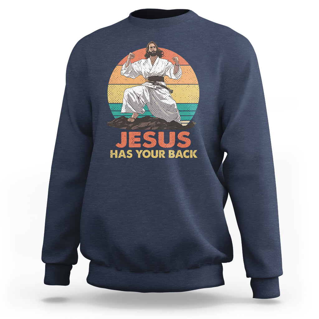 Navy Christian sweatshirt with 'JESUS HAS YOUR BACK' graphic and seated figure