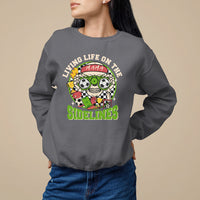Charcoal crewneck sweatshirt with soccer-themed 'Sidelines' graphic on chest