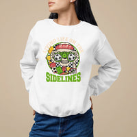 White crewneck sweatshirt with soccer-themed 'Sidelines' graphic on chest