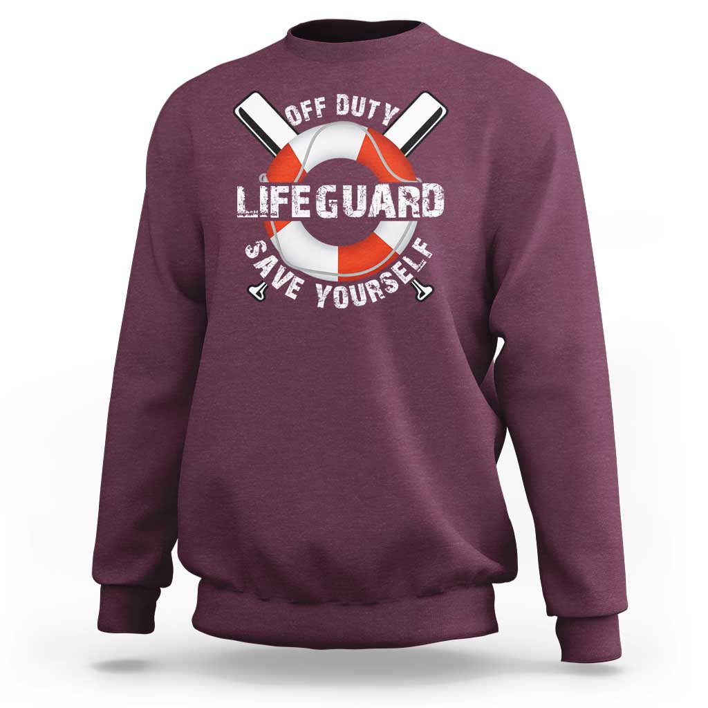 Maroon crewneck sweatshirt with lifeguard ring graphic and “Save Yourself” text