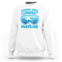 White crewneck sweatshirt with scuba diving “Work Well Under Pressure” graphic