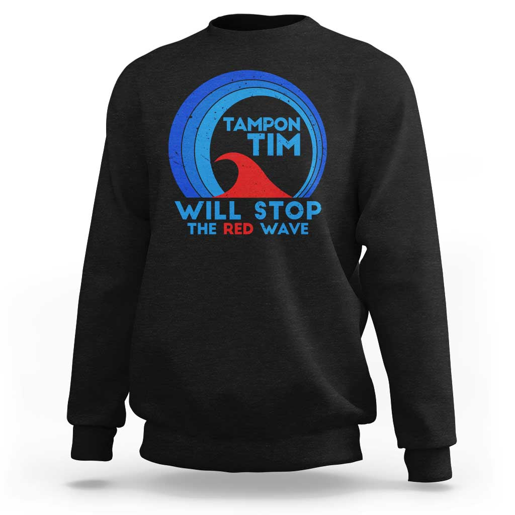 Black crewneck sweatshirt with circular graphic and text “WILL STOP THE RED WAVE”.