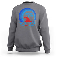 Charcoal gray crewneck sweatshirt with circular graphic and text “WILL STOP THE RED WAVE”.