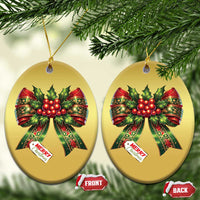 Gold oval Christmas bow ornaments with red holly ribbons and “Merry Christmas” tag