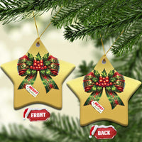Gold star-shaped Christmas bow ornaments with red holly ribbons and “Merry Christmas”