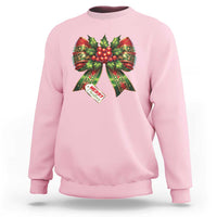 Light pink crewneck sweatshirt with colorful Christmas bow graphic and 'MERRY' text