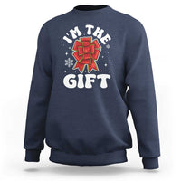 Navy unisex Christmas sweatshirt with 'I'm the gift' graphic and red bow illustration