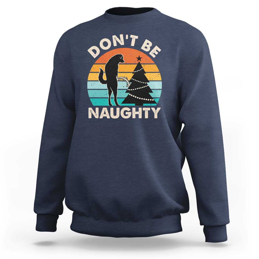 Navy crewneck sweatshirt with “DON’T BE NAUGHTY” graphic and dog silhouette