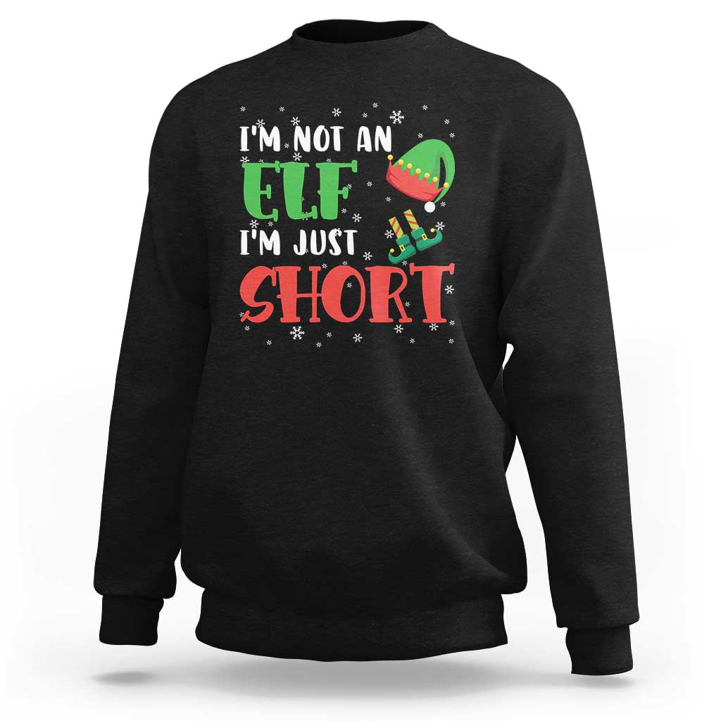 Black crewneck sweatshirt with elf graphic and text "I'm not an elf, I'm just short"