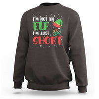 Charcoal crewneck sweatshirt with elf graphic and text "I'm not an elf, I'm just short"