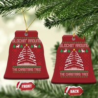 Set of red bell-shaped Christmas ornaments with hanging gold loops and tree design