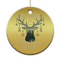 Gold round deer Christmas ornament with “OH DEER” and “Christmas is here” text