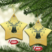 Gold star-shaped deer Christmas ornaments with “OH DEER” and “Christmas is here” text