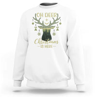 White crewneck sweatshirt with “OH DEER” antler graphic and “Christmas is Here” print