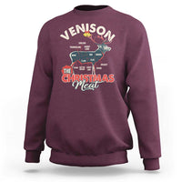 Maroon sweatshirt with “The Christmas Meat” graphic and deer antler design