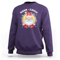 Purple crewneck sweatshirt with Santa graphic and 'NAMA-SLEIGH' print