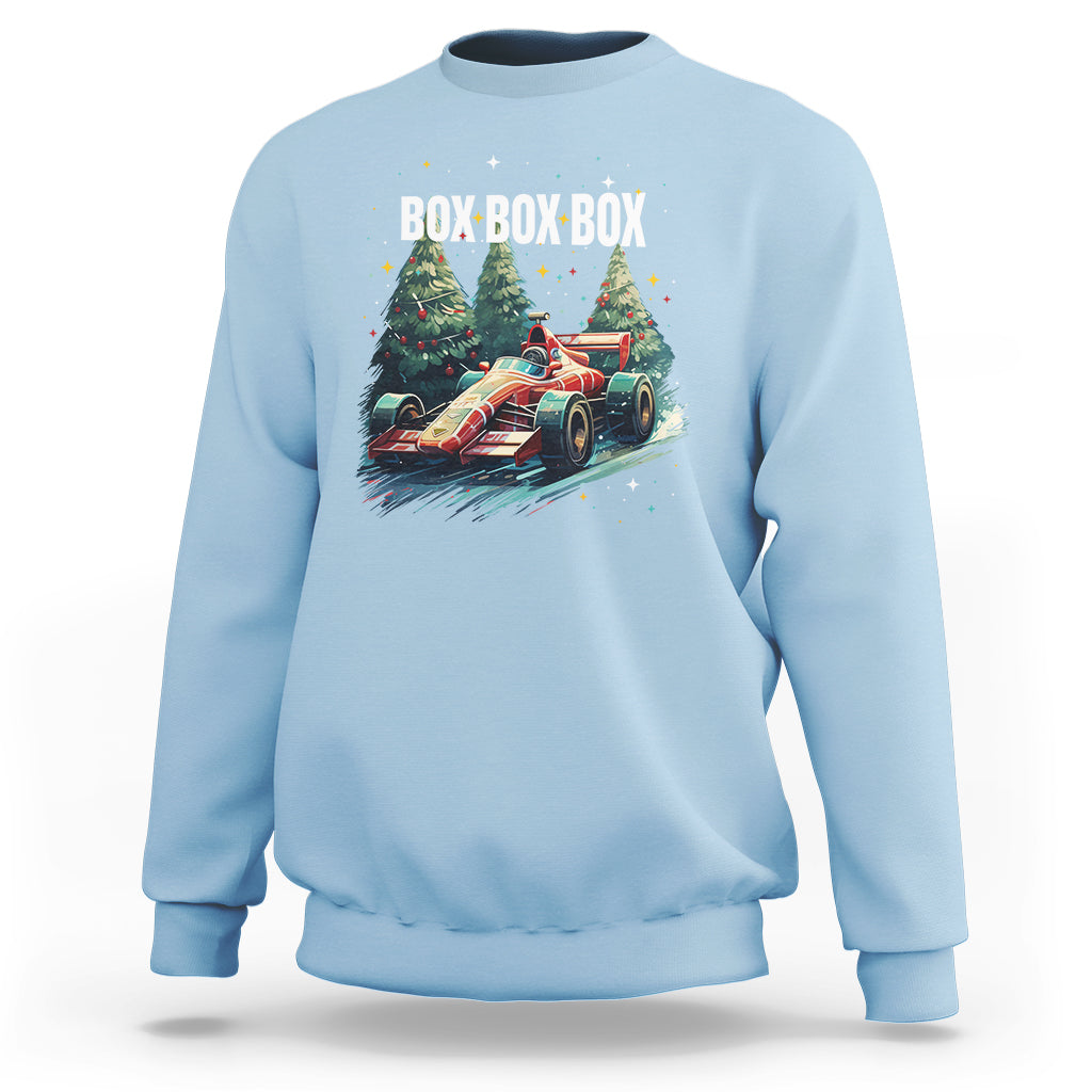 Light blue crewneck sweatshirt with Christmas race-car graphic and “BOX BOX BOX” text