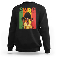 Black crewneck sweatshirt with multicolor “SWAG” graphic and portrait artwork