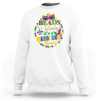 White crewneck sweatshirt with multicolor “Beads bling” Mardi Gras graphic on front.