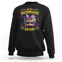 Black Mardi Gras sweatshirt with masquerade mask graphic and 'Shenanigans Begin'.