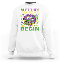 White crewneck sweatshirt with Mardi Gras graphic: leopard lips and fleur-de-lis, “Let the Shenanigans Begin”.