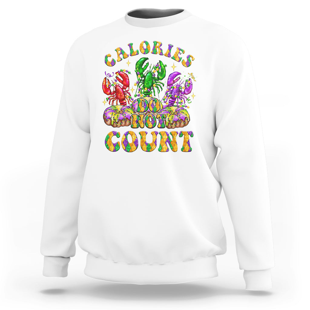White Mardi Gras sweatshirt with colorful 'Calories don't count' graphic on chest.