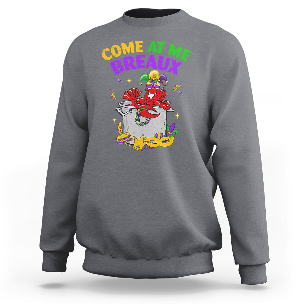 Light gray crewneck sweatshirt with colorful Mardi Gras crawfish graphic on chest