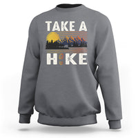 Charcoal gray hiking sweatshirt with “Take a Hike” front graphic and mountain scene