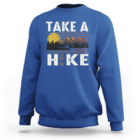 Royal blue hiking sweatshirt with “Take a Hike” front graphic and mountain scene