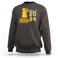Dark chocolate graduation sweatshirt with “Class of 2024” graphic and cap-and-gown emblem