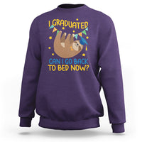 Purple graduation sweatshirt with sloth graphic and “Can I go back to bed now?” text