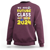 Maroon crewneck sweatshirt with “We Are the Future” Class of 2024 graphic