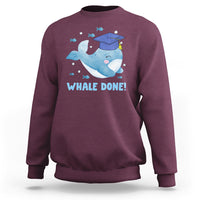 Maroon graduation sweatshirt with cute whale graphic and “WHALE DONE!” print