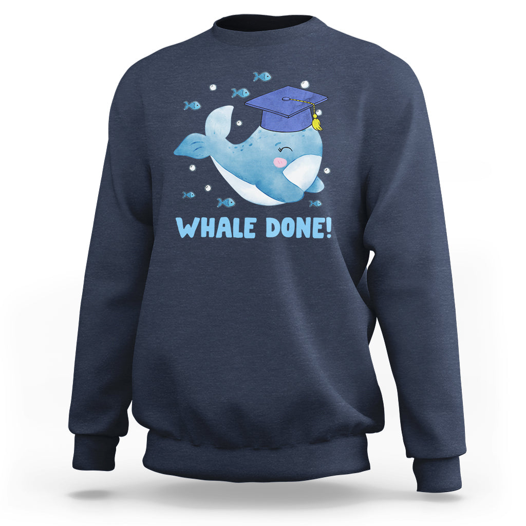 Navy graduation sweatshirt with whale graphic and “WHALE DONE!” lettering