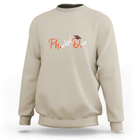 PhD graduation sweatshirt in sand with chest graduation graphic and mortarboard, crewneck