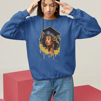 Royal blue crewneck sweatshirt with front doctorate cap graphic and dripped text