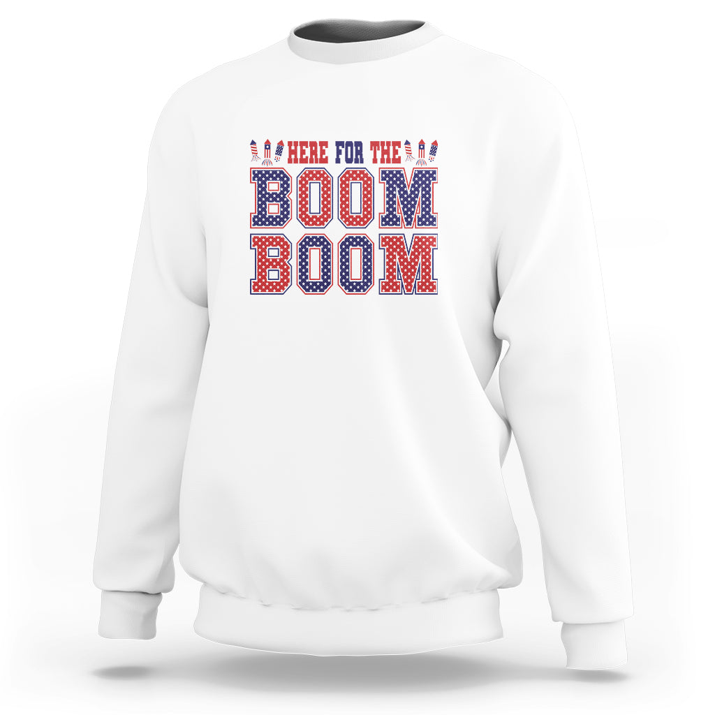 White sweatshirt with red/blue "BOOM" graphic text