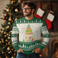 Green Christmas sweater with colorful tree graphic and 'Feliz Navidad' lettering