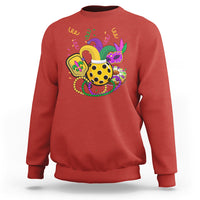Red sweatshirt with colorful Mardi Gras jester-style pickleball graphic on chest