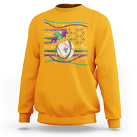 Gold crewneck sweatshirt with colorful jester hat Mardi Gras graphic on chest