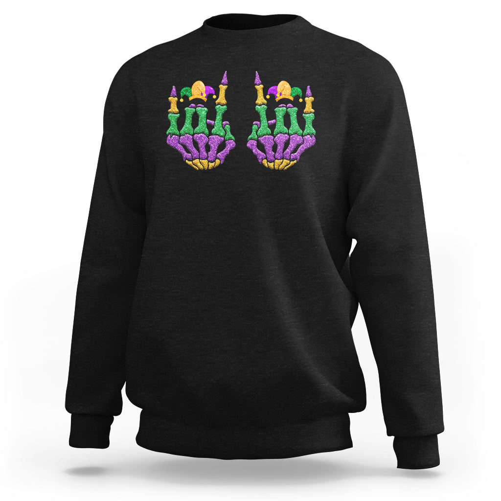 Black crewneck sweatshirt with colorful Mardi Gras jester skeleton hand graphic on chest