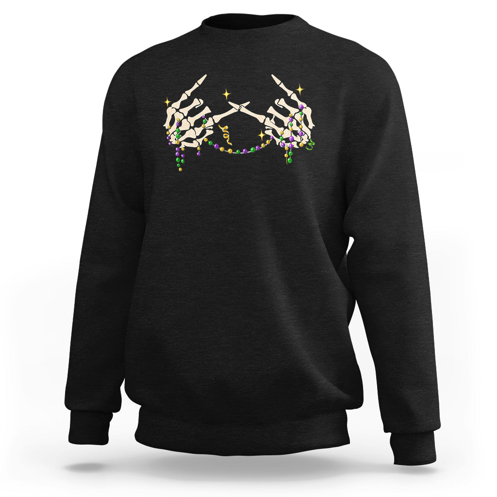 Black Mardi Gras crewneck sweatshirt with beaded skeleton hand graphic across chest