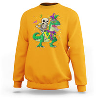 Gold sweatshirt with colorful skeleton riding a green dinosaur jester graphic