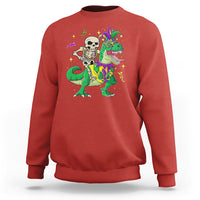 Red sweatshirt with colorful skeleton riding a green dinosaur jester graphic