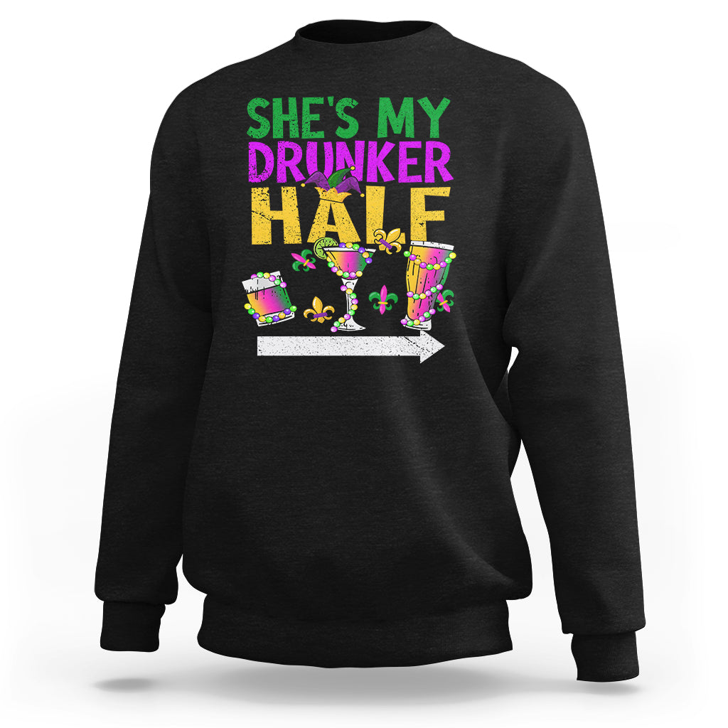 Black crewneck sweatshirt with “She’s My Drunker Half” Mardi Gras graphic on front.