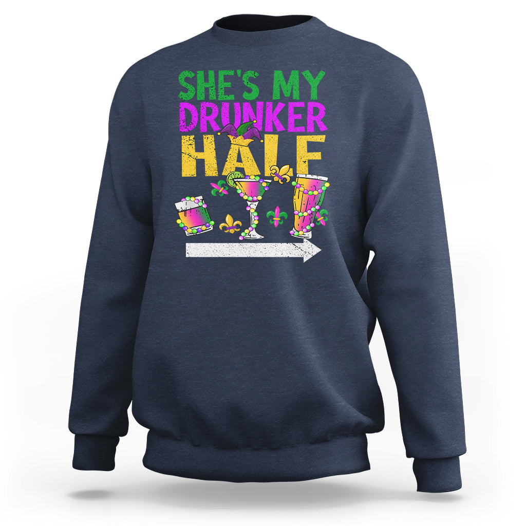 Navy crewneck sweatshirt with “She’s My Drunker Half” Mardi Gras graphic on front.