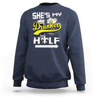 Navy sweatshirt with “She's My Drunker” and illustrated fleur-de-lis text graphic
