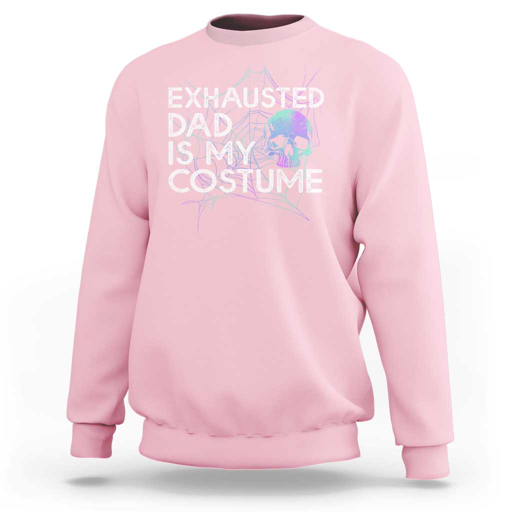 Light pink Halloween sweatshirt with “Exhausted Dad Is My Costume” skull graphic on chest